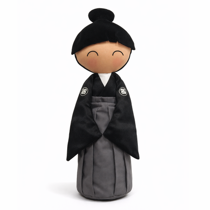 Japanese KUMIS doll dressed in formal brown attire