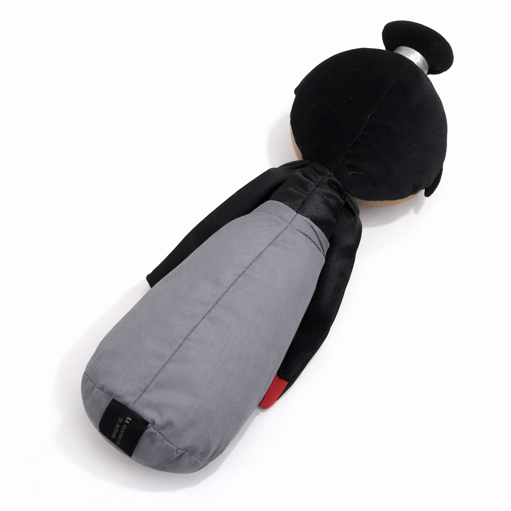 Japanese KUMIS doll dressed in formal brown attire